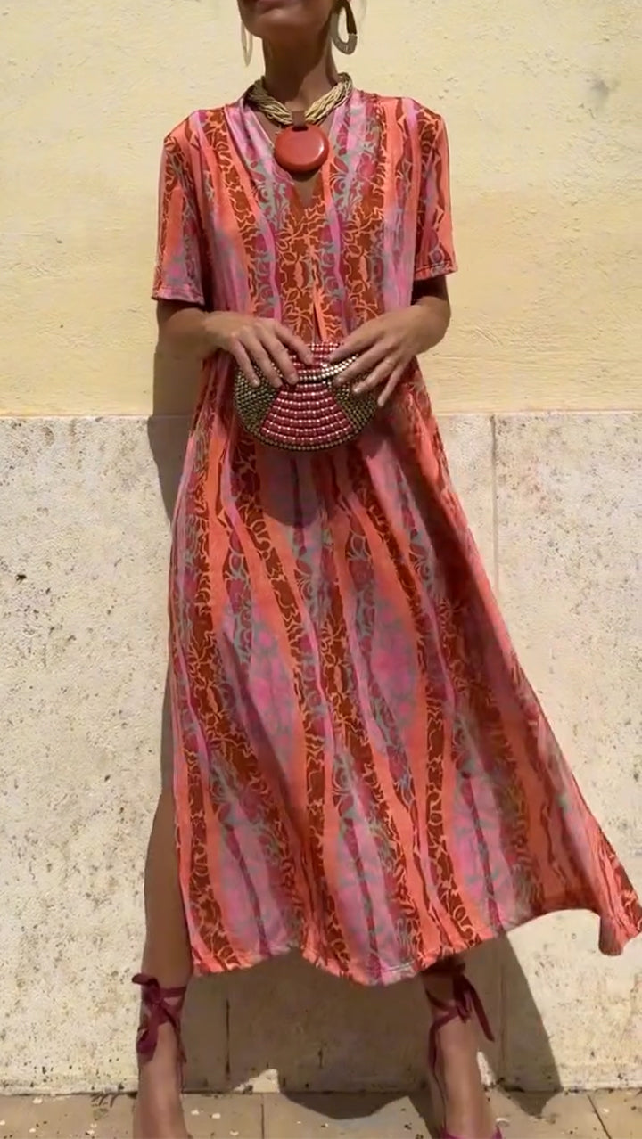 Γυναικείο casual φόρεμα με V ντεκολτέ, κάθετο τύπωμα και σκίσιμο