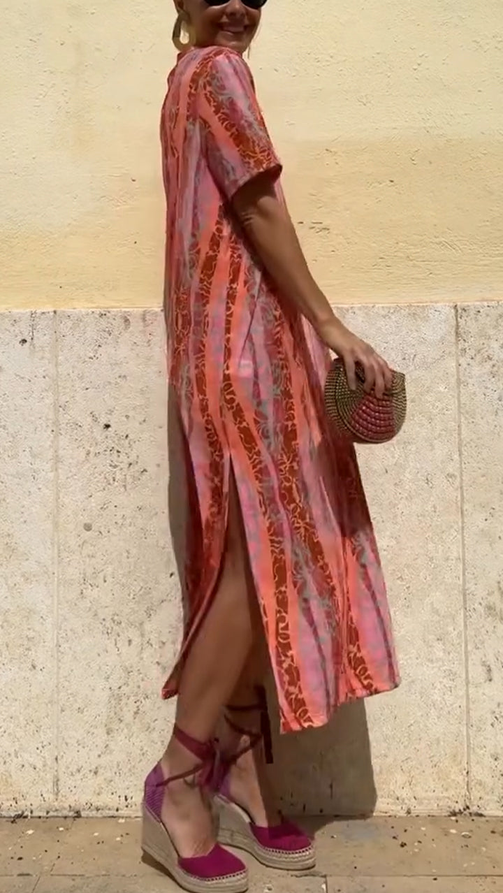 Γυναικείο casual φόρεμα με V ντεκολτέ, κάθετο τύπωμα και σκίσιμο