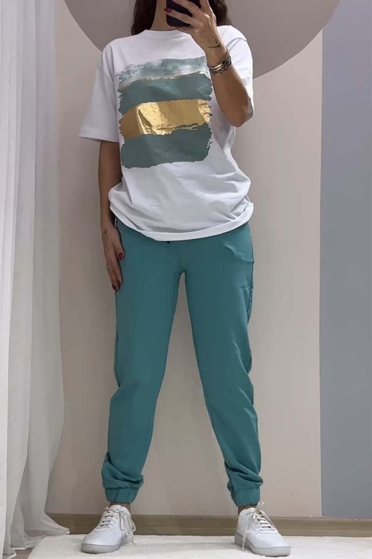 Casual κοστούμι από φύλλα χρυσού, που αποτελείται από μπλούζα και παντελόνι