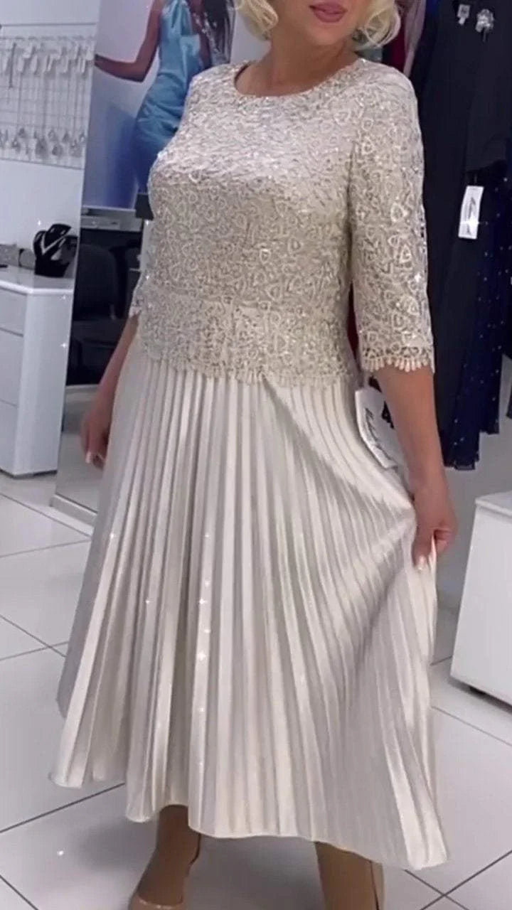 Γυναικείο φόρεμα με στρογγυλή λαιμόκοψη και πούλιες