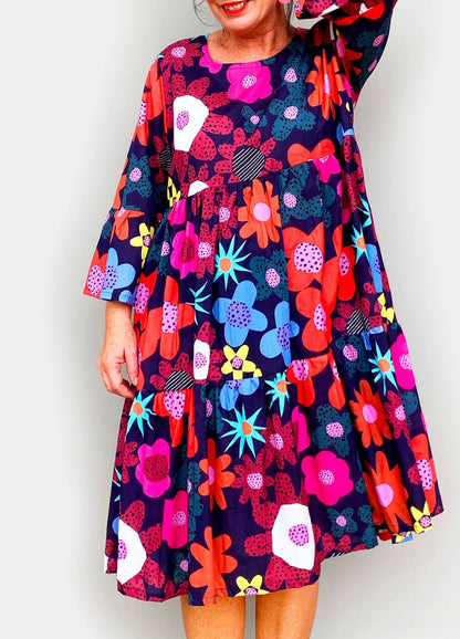 Φόρεμα με φλοράλ print και στρογγυλή λαιμόκοψη, με τσέπες και σορτσάκι