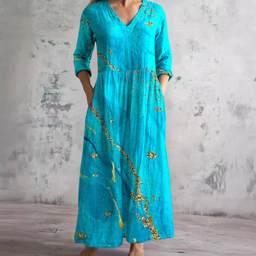 Γυναικείο μακρύ φλοράλ φόρεμα με V ντεκολτέ και μανίκια τριών τετάρτων