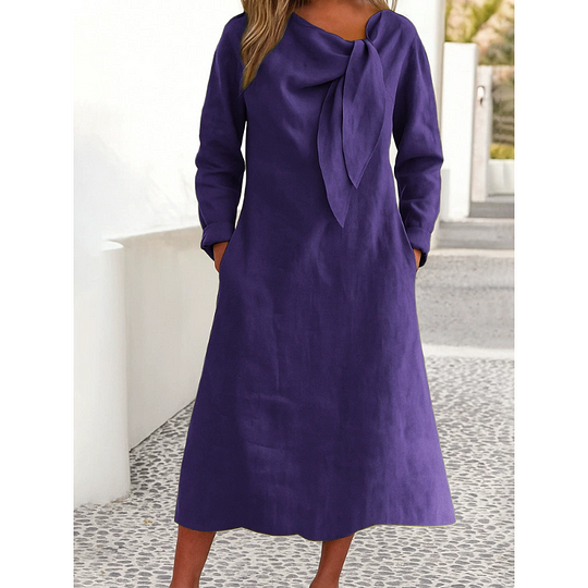 Μονόχρωμο φόρεμα με στρογγυλή λαιμόκοψη και μακριά μανίκια