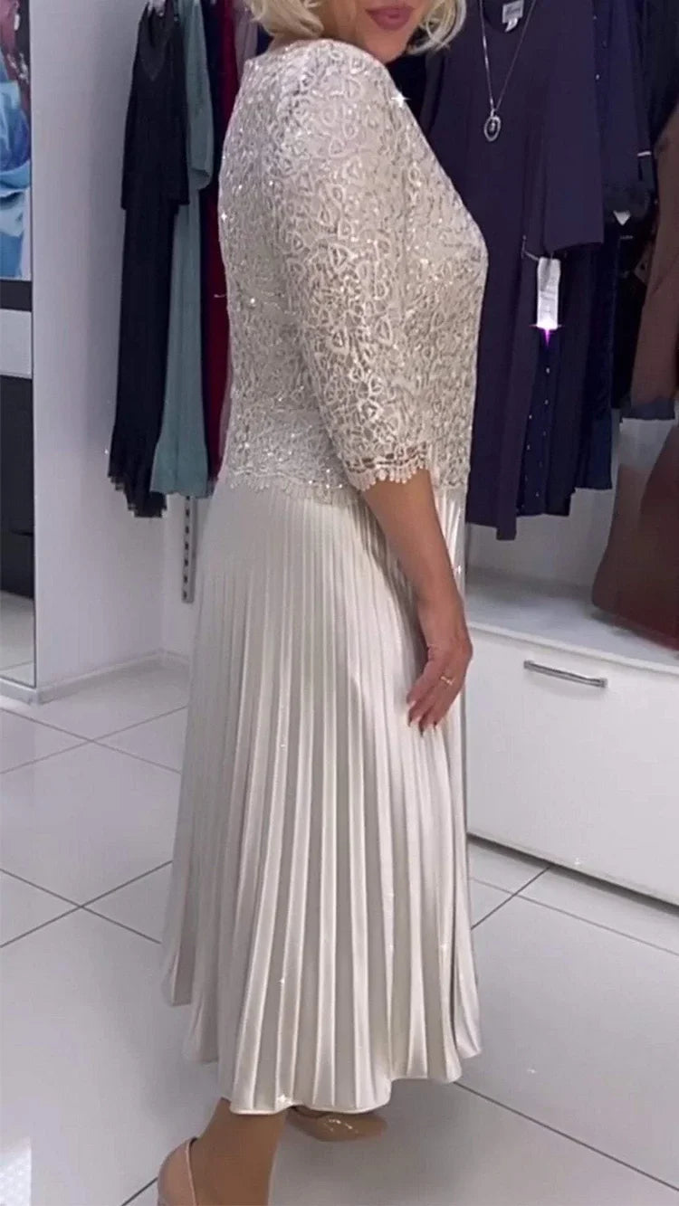 Γυναικείο φόρεμα με στρογγυλή λαιμόκοψη και πούλιες